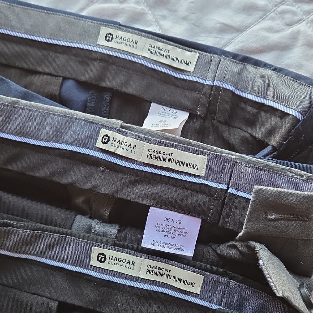 3 Pair Haggar dress pants. Available in charcoal, navy, and black. 36x29 - Picture 9 of 13